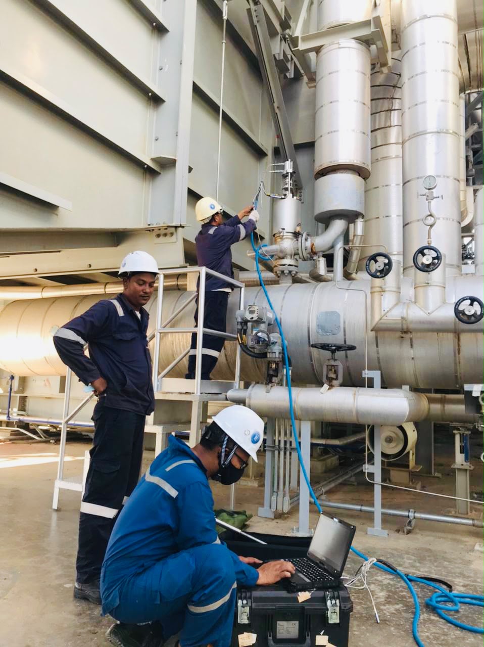 GIE team performing valve servicing at an oil and gas plant
